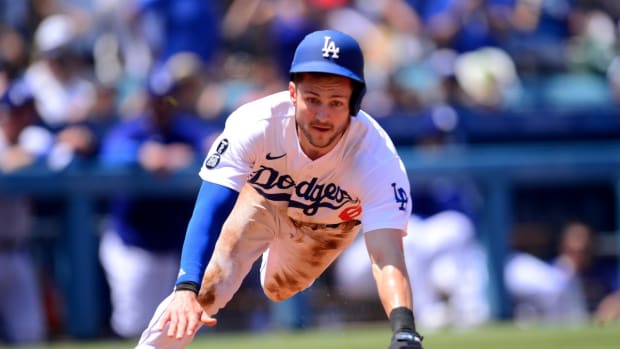 Aug 8, 2021; Los Angeles, California, USA; Los Angeles Dodgers second baseman Trea Turner (6) scores a run against the Los Angeles Angels during the second inning at Dodger Stadium.